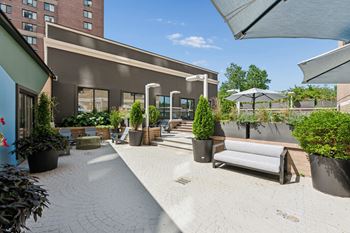 Outdoor courtyard at 15 bank apartments in white plains, ny 10606